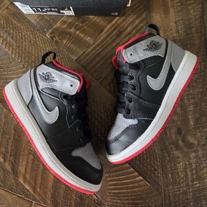 Nike Black and Gray High-Top Sneakers with Red Accents